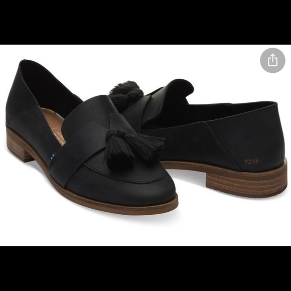 Tom’s black tassel loafers